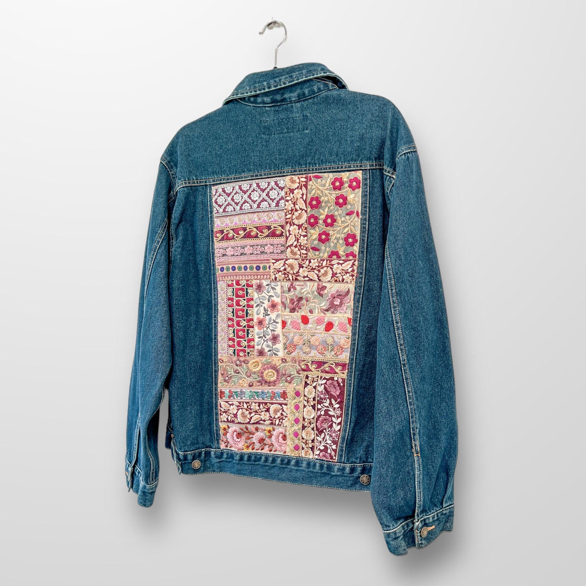 Upcycle clothing. Embellished jean jacket with patchwork sari scraps on back. Sustainable fashion.