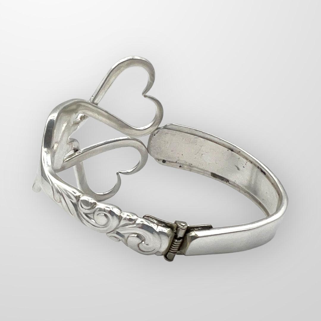 Upcycle Double Heart Fork Bracelet from vintage silver plated cutlery. Size large.