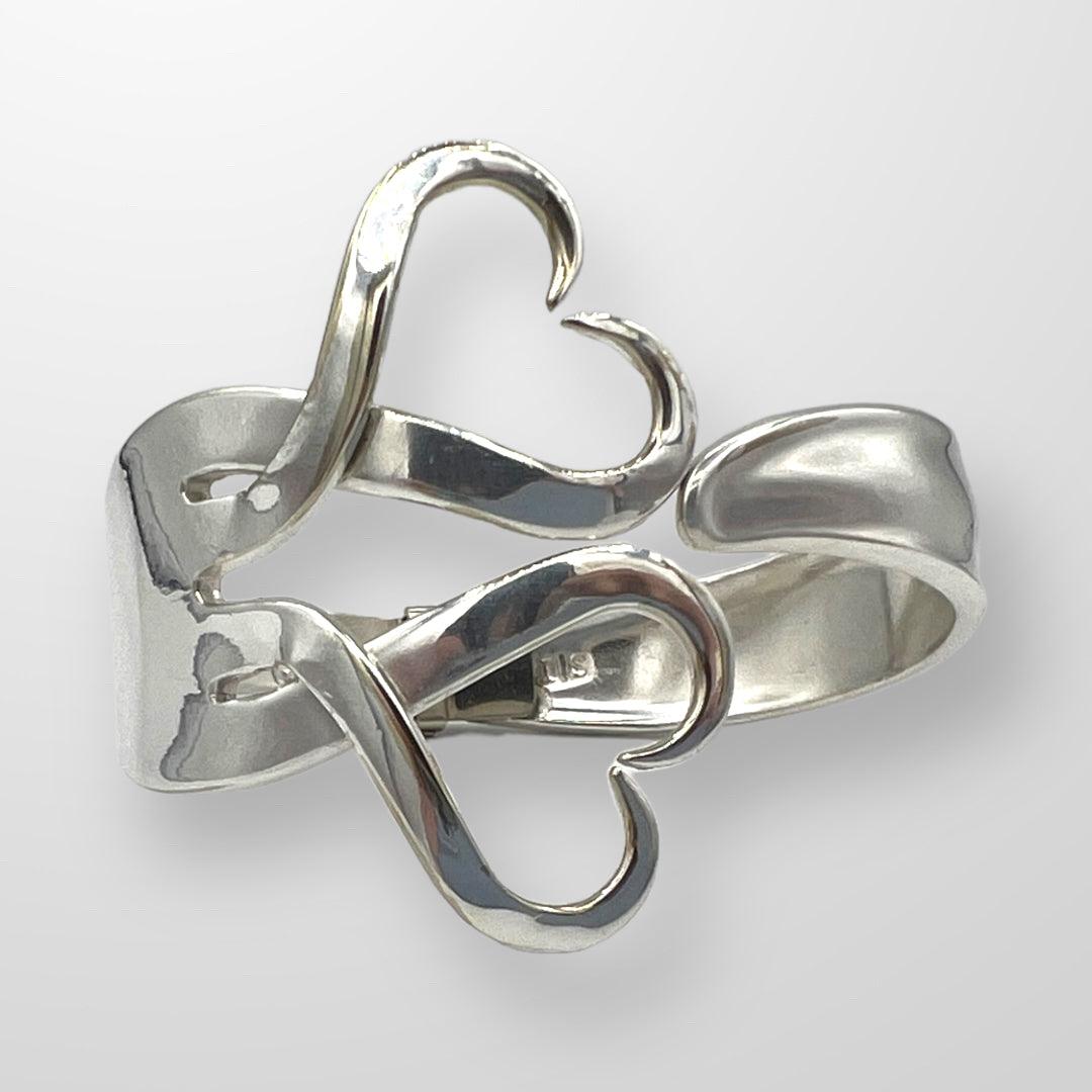 Upcycle Double Heart Fork Bracelet from vintage silver. Size large plated cutlery. Size small.