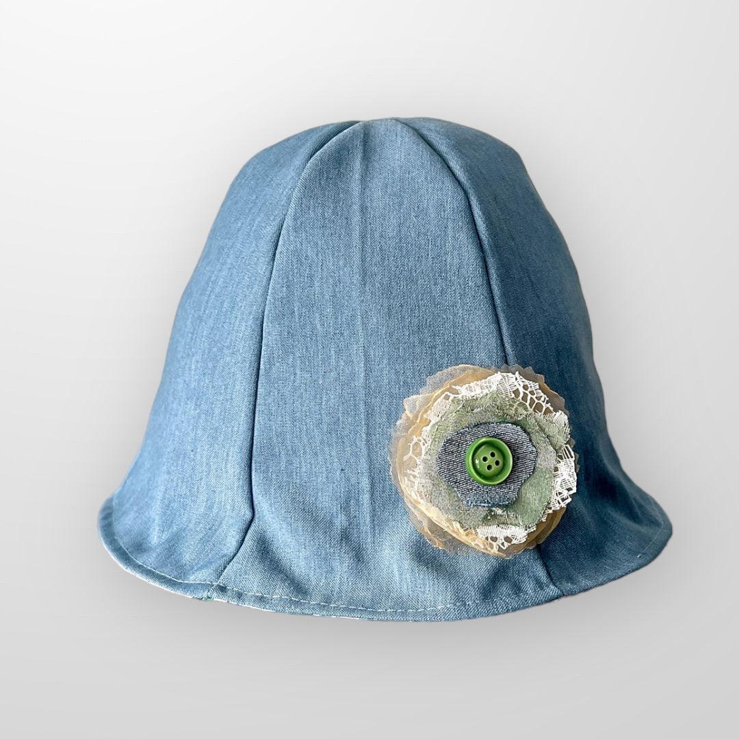 Upcycle floral bucket sun hat reversible with scrap flower pin.