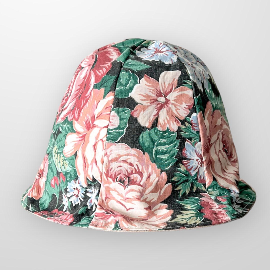 Upcycled reversible sun bucket hat with removal scrap fabric flower pin.